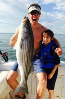 Chris Cuomo fishing with son (+ abs & biceps)