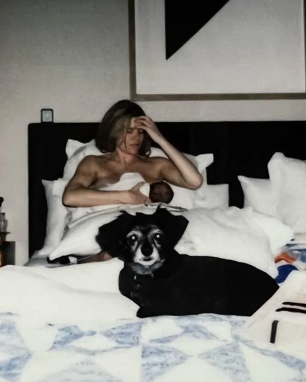 Emma Greenwell with her baby and pet